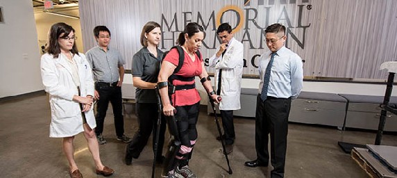 Patient walks with help of exoskeleton